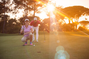 couple playing golf