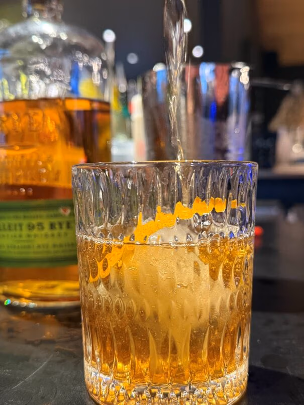 Bourbon pouring and flowing